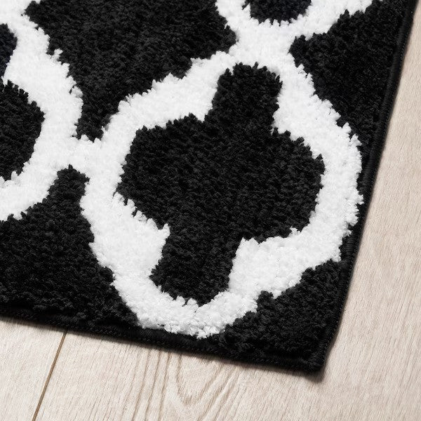 AUNING Kitchen mat, black/white, 45x120 cm